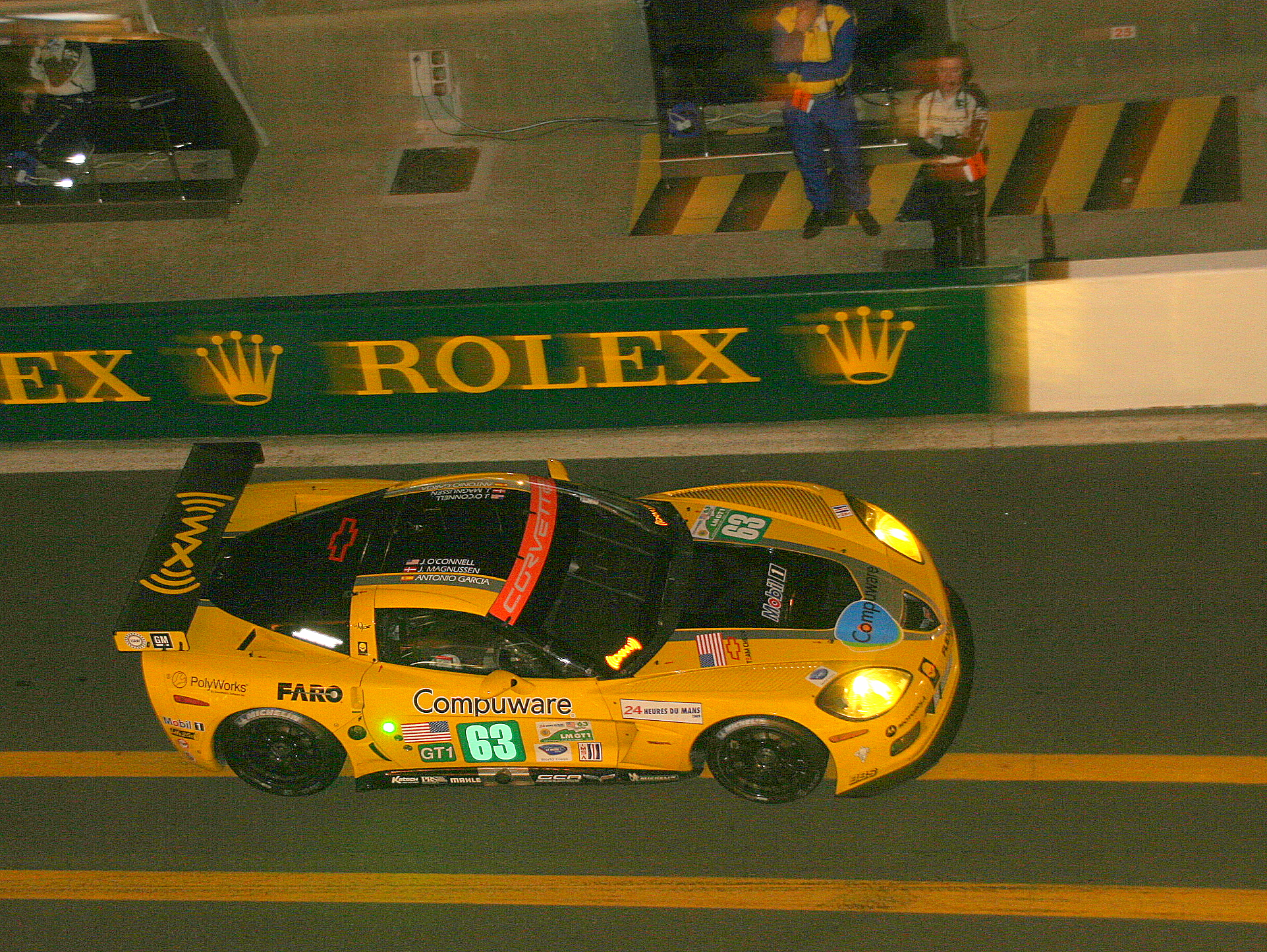 Corvette C6-R - Jan Magnussen, Johnny O`Connell & Antonio Garcia in the pit lane at the 2009 Le Mans (55114017410).jpg